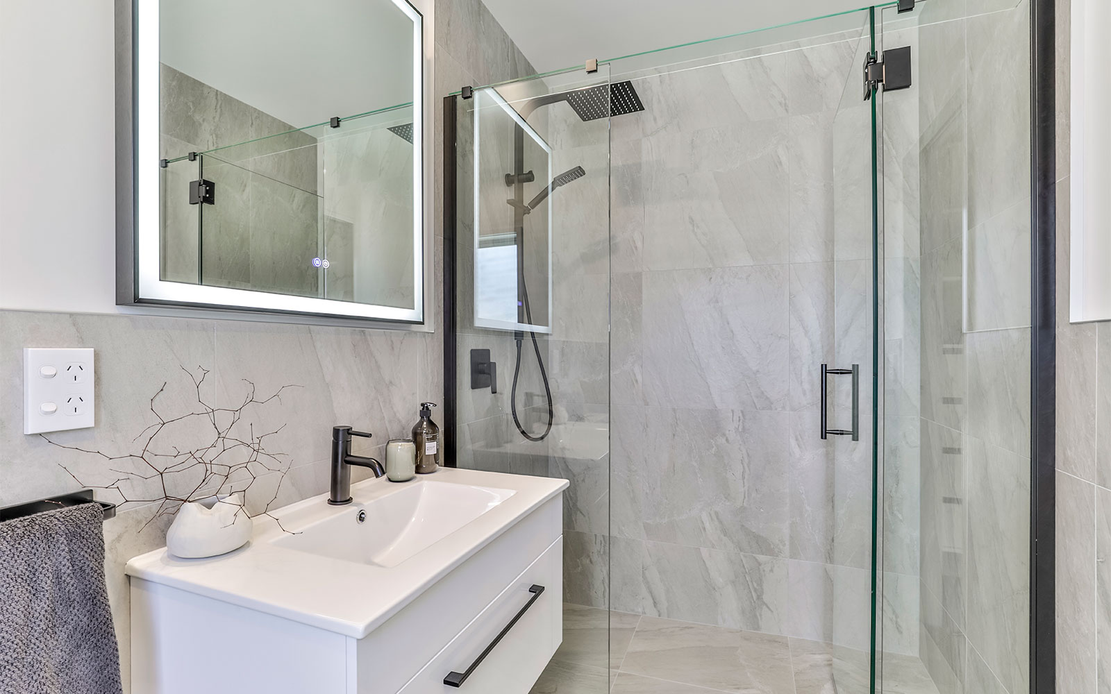 Modern bathroom with tiled walls
